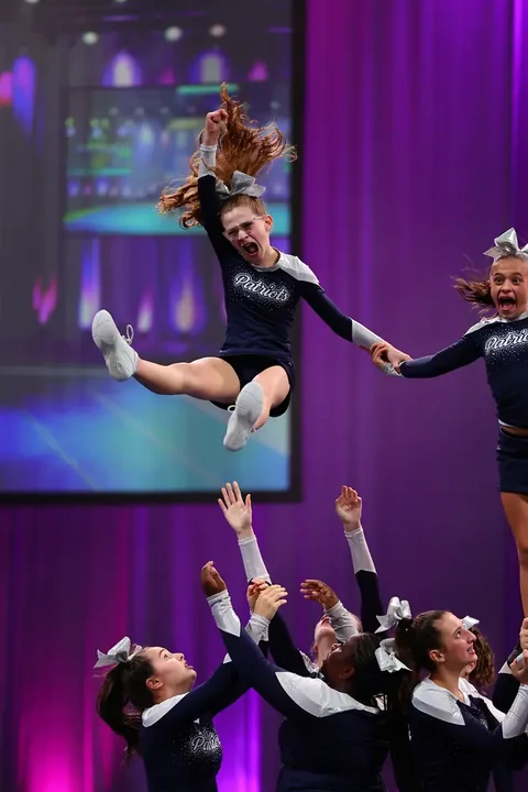 Cheer and dance action photography at American Youth Football & Cheer