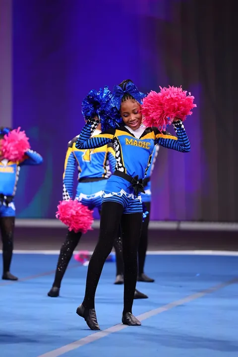 Cheer and dance action photography at American Youth Football & Cheer
