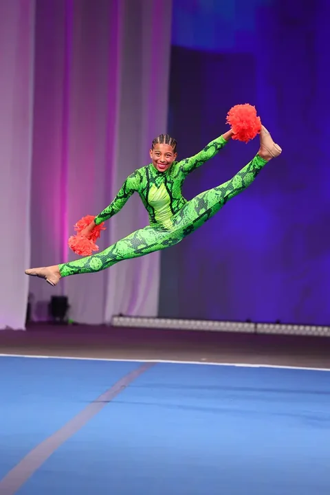 Cheer and dance action photography at American Youth Football & Cheer