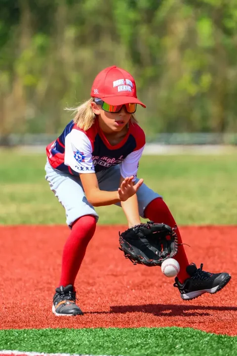 Youth baseball action photography at Babe Ruth League