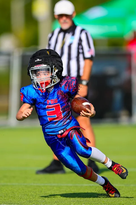 Young running back cutting with the ball