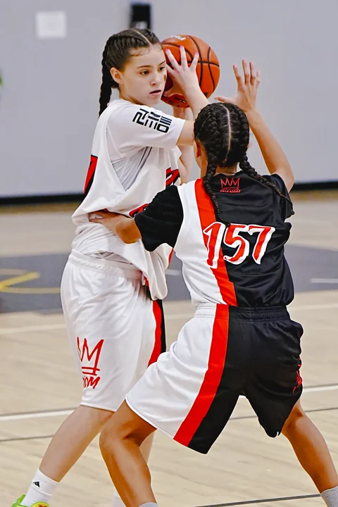 Guard looking to pass over a defender